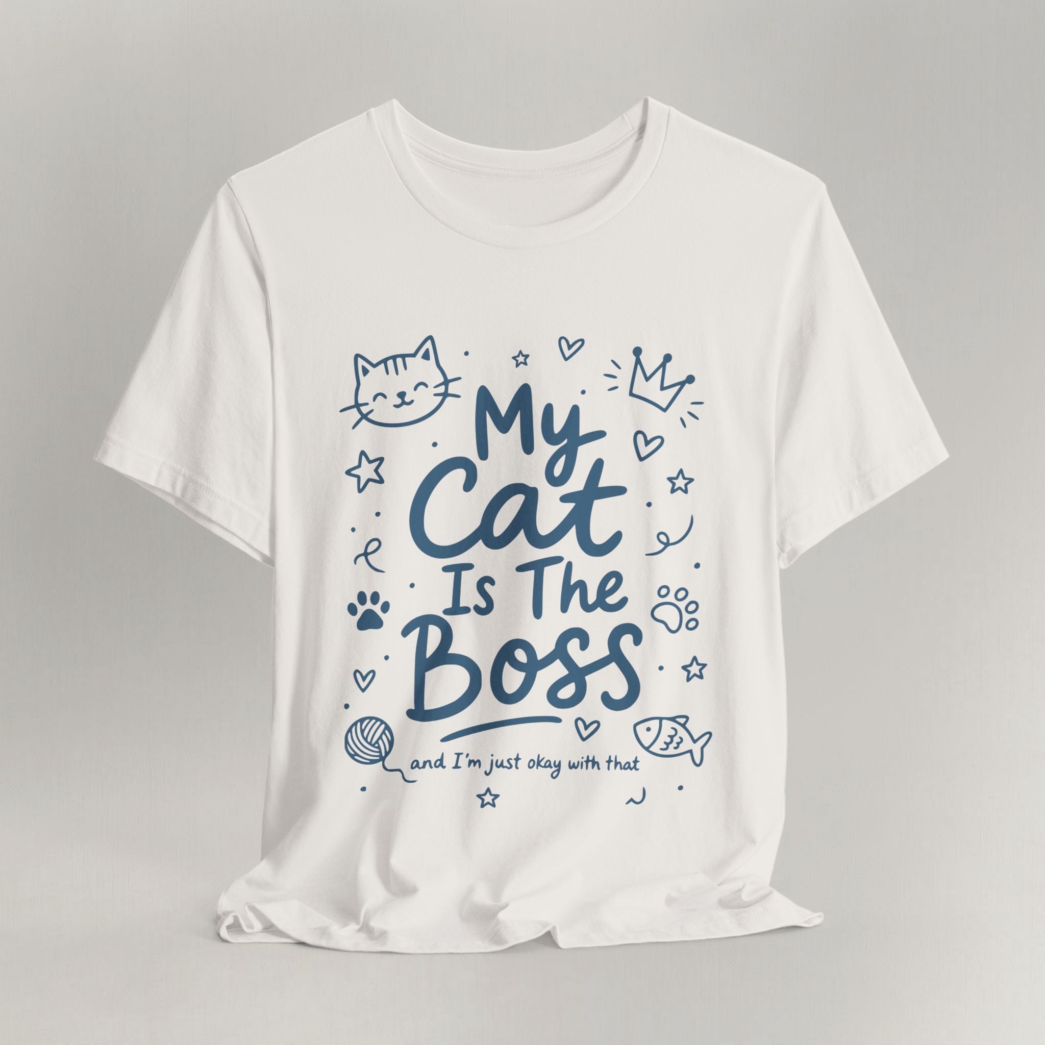 Flat lay of vintage white graphic cat t-shirt with My Cat Is The Boss print design