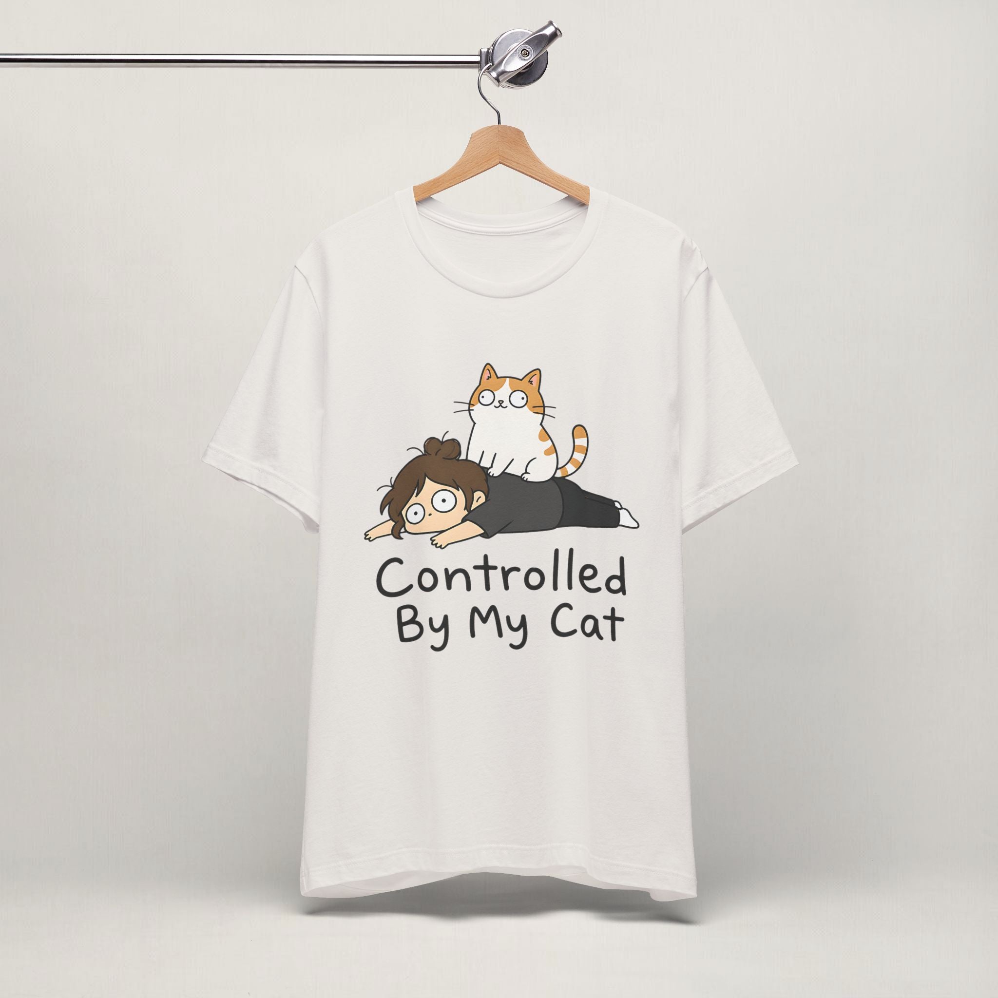Close-up of orange tabby Controlled By My Cat print on vintage white unisex t-shirt