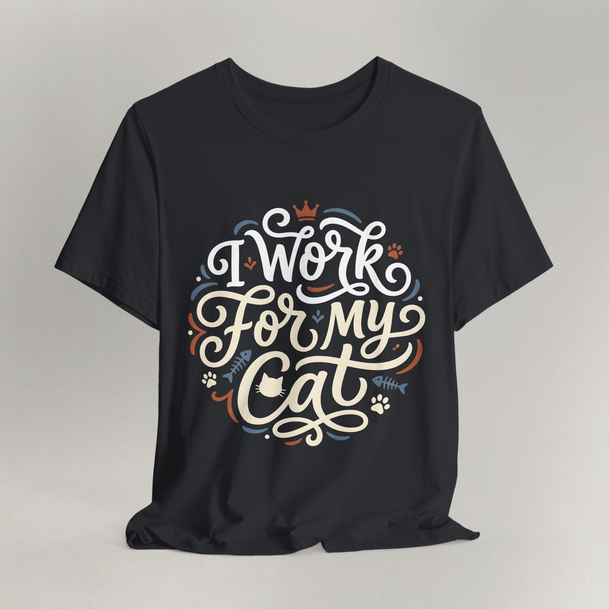 Flat lay of vintage black graphic cat t-shirt with I Work For My Cat print design