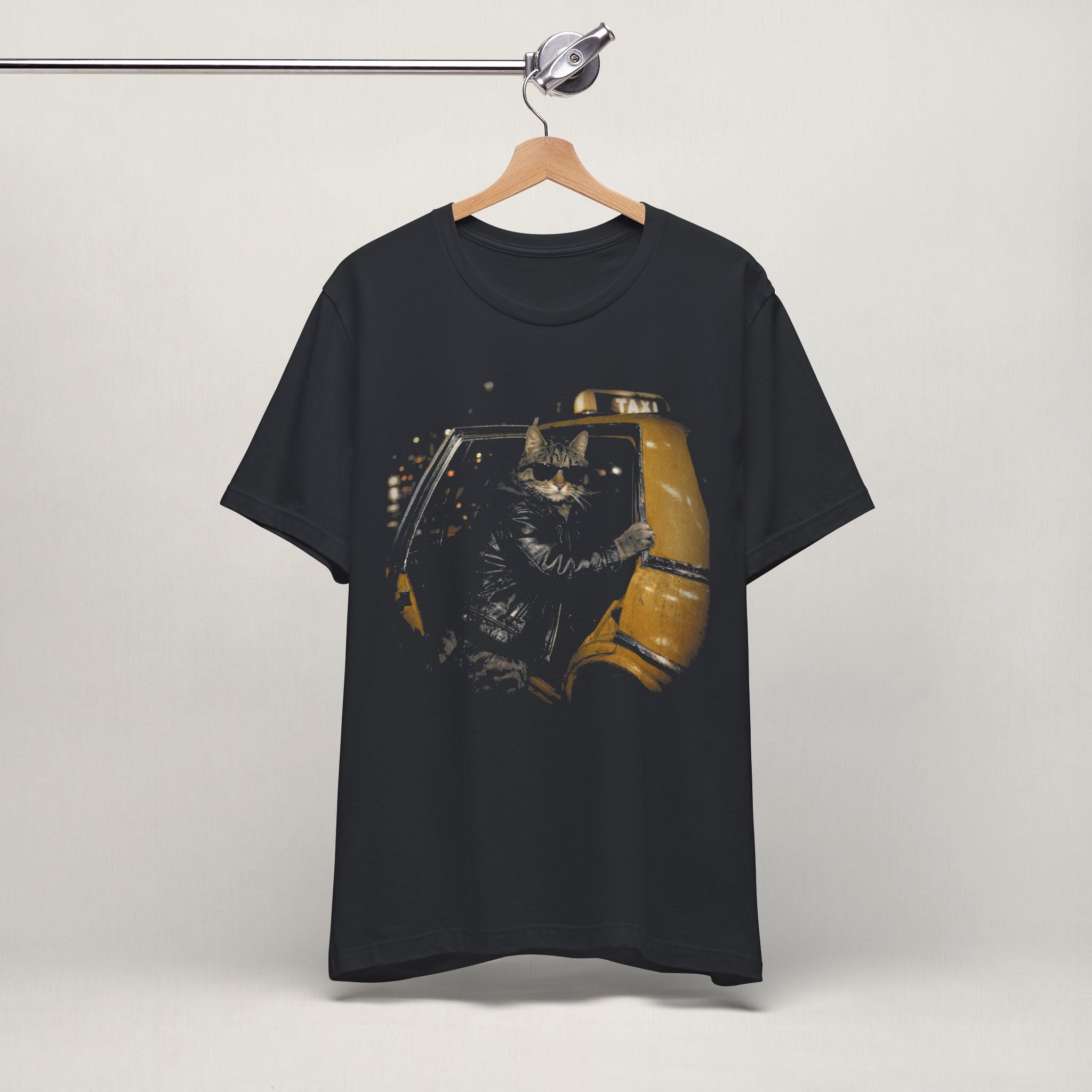 Side view of model wearing vintage black Midnight Taxi cat t-shirt
