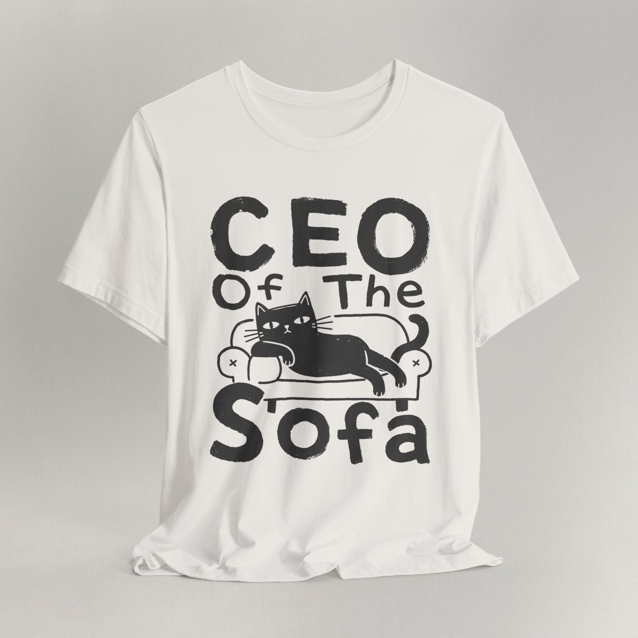 Flat lay of vintage white graphic cat t-shirt with CEO Of The Sofa print design