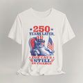 Flat lay of vintage white graphic cat t-shirt with 250 Years Later patriotic cat design