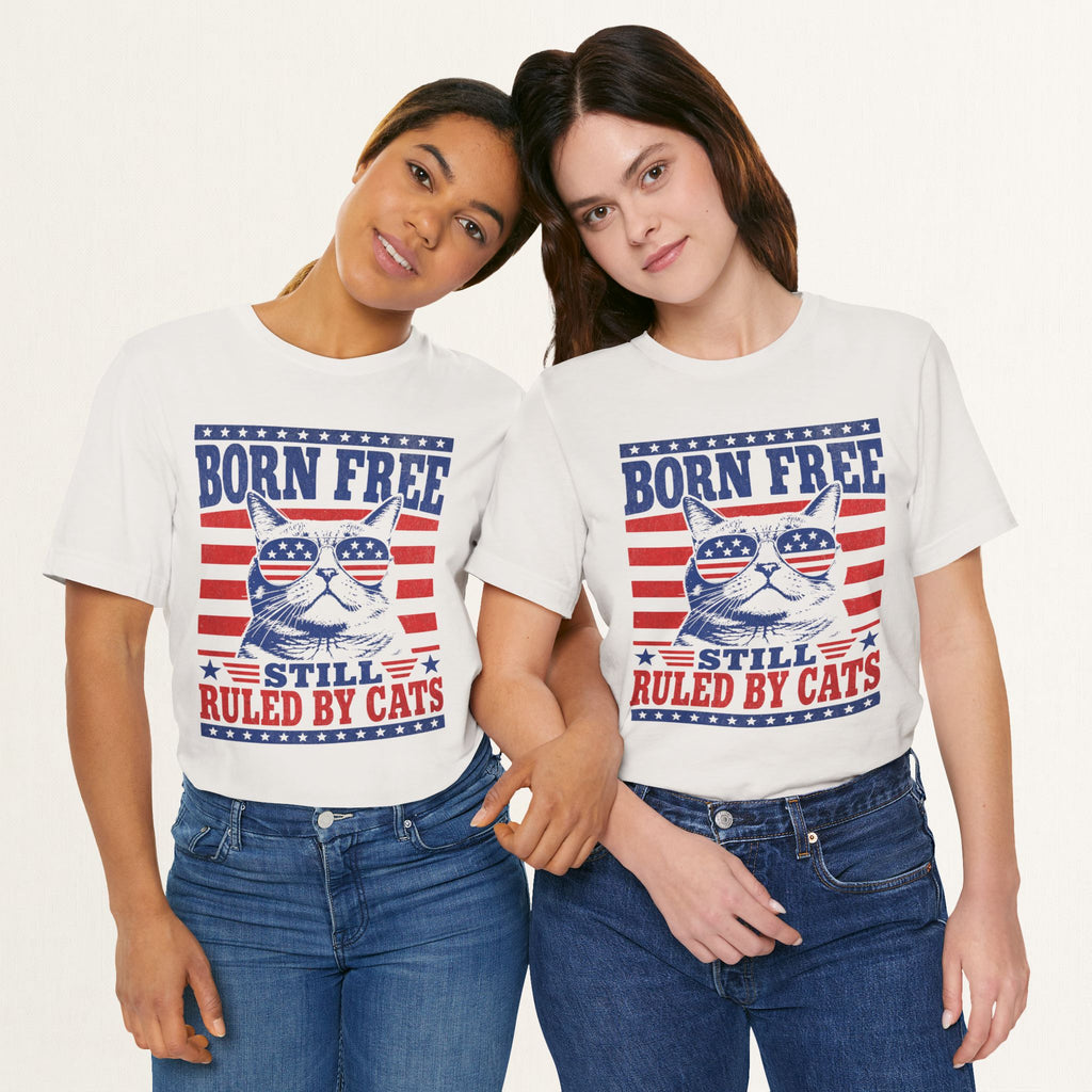 Styled flat lay of vintage white Born Free Still Ruled By Cats patriotic cat tee