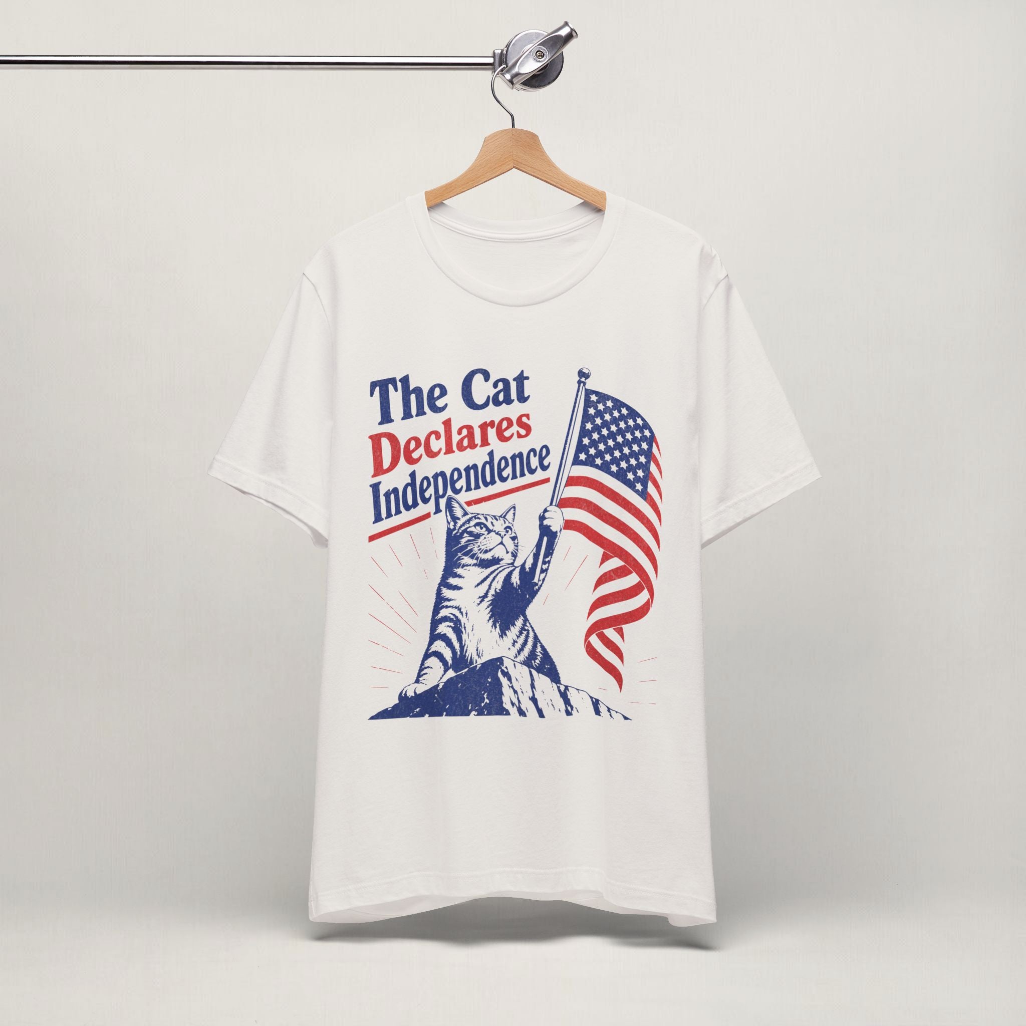 Close-up of Declares Independence patriotic cat print on vintage white unisex t-shirt