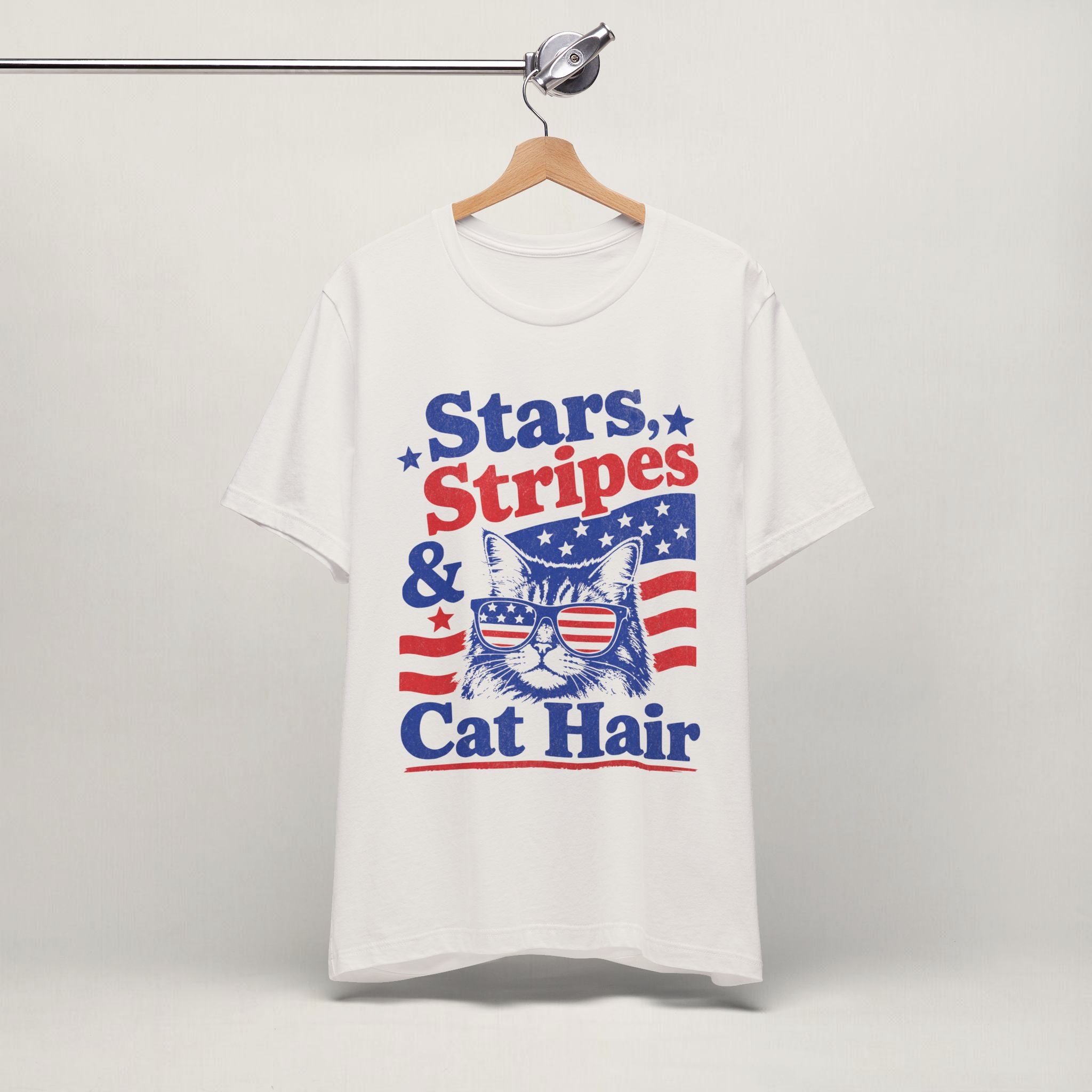 Close-up of Stars Stripes and Cat Hair print on vintage white unisex t-shirt