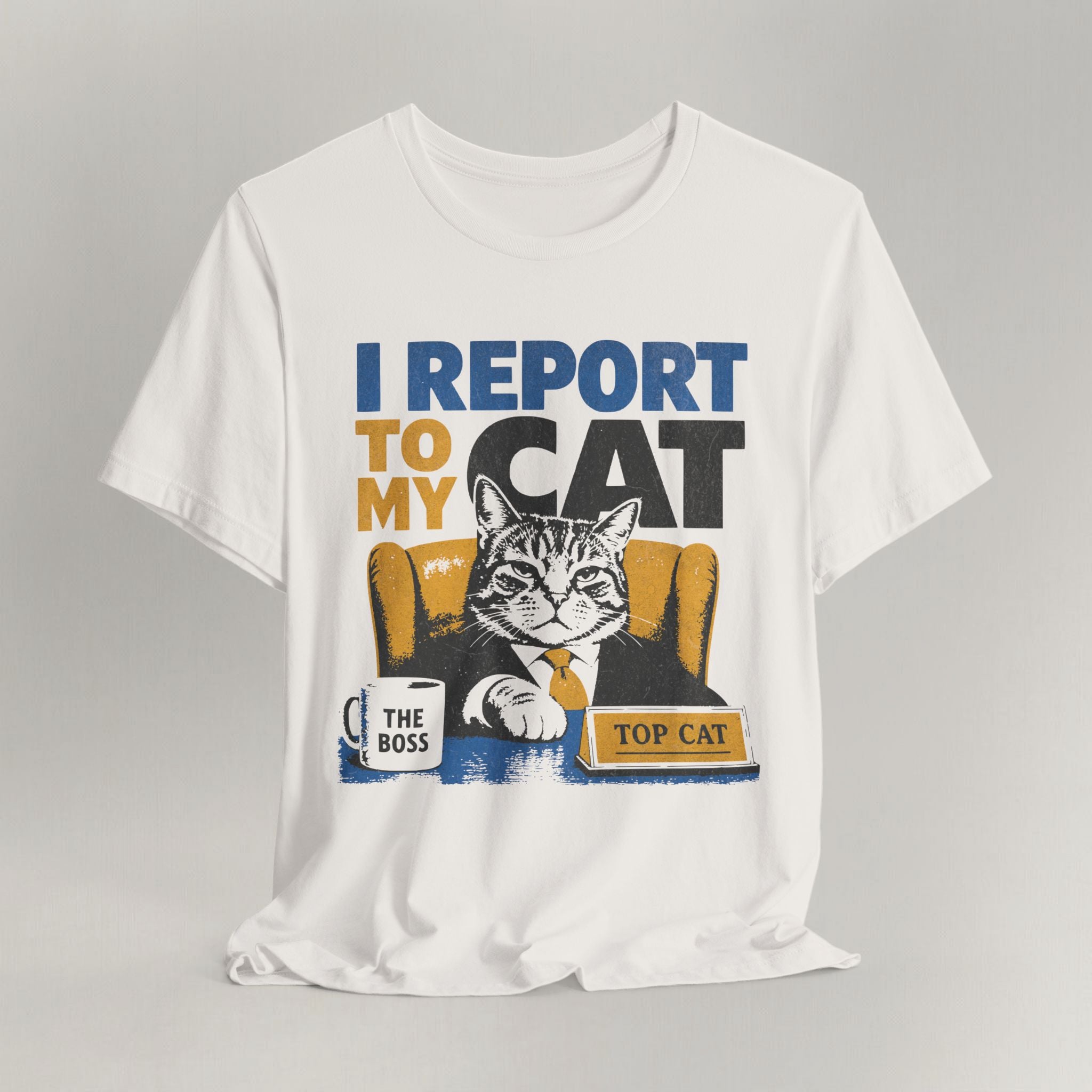 Vintage white graphic cat t-shirt with I Report To My Cat print, flat lay front view