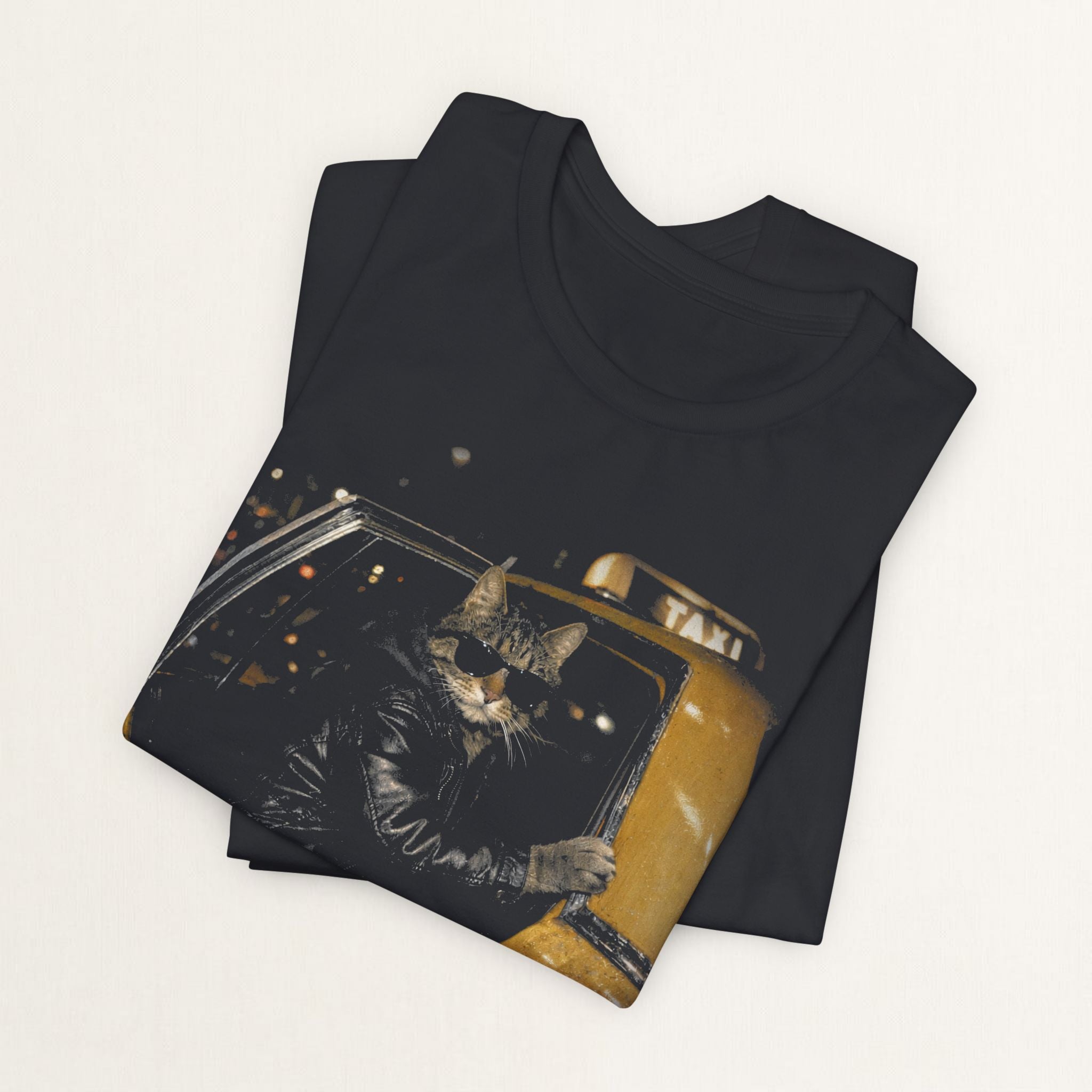 Woman wearing vintage black Midnight Taxi graphic cat t-shirt, front view