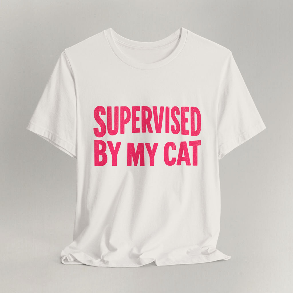 Vintage white t-shirt with bold pink Supervised By My Cat graphic and comic-style star bursts