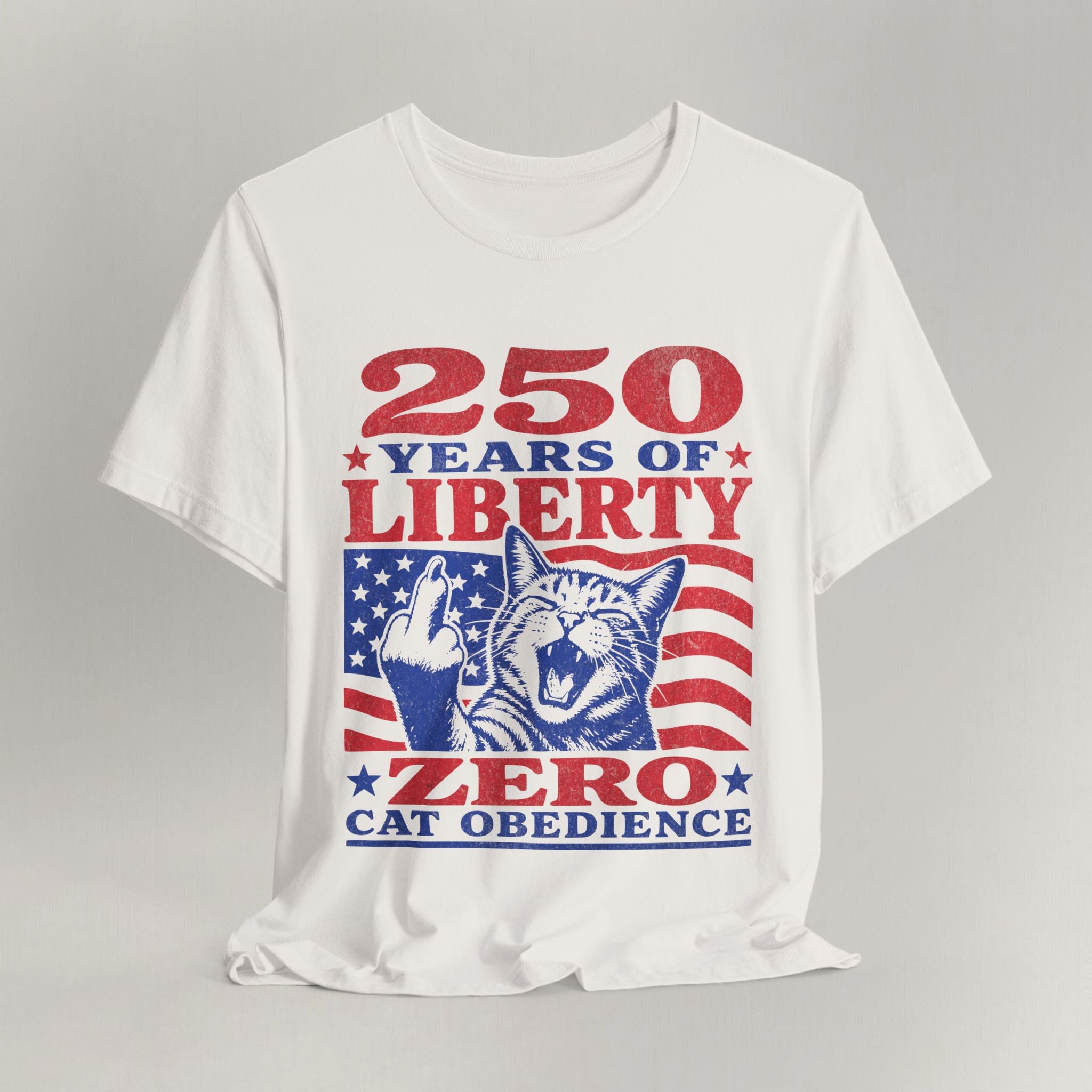 Vintage white Zero Cat Obedience t-shirt with patriotic flag print shown laid flat