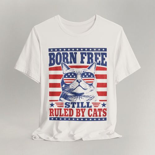 Flat lay of vintage white patriotic cat t-shirt with Born Free Still Ruled By Cats print design