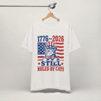 Close-up of 1776-2026 Ruled By Cats patriotic print on vintage white unisex t-shirt