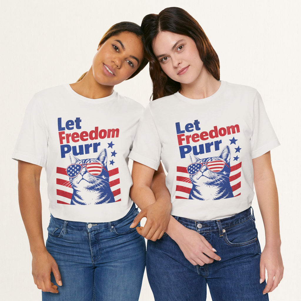 Styled flat lay of vintage white Let Freedom Purr cat graphic tee