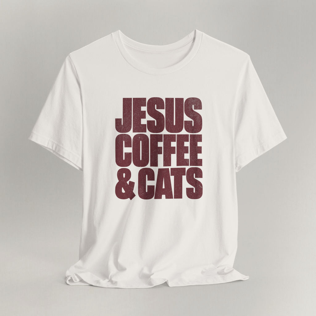 Vintage white cat t-shirt with a Jesus, Coffee & Cats design in bold letters, shown flat