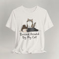 Flat lay of vintage white graphic cat t-shirt with Bossed Around By My Cat print design