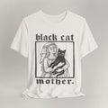 Vintage white cat t-shirt with a Black Cat Mother vintage design of a woman and her black cat, shown flat