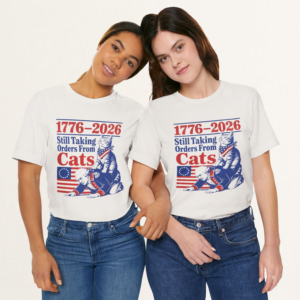 Styled flat lay of vintage white Still Taking Orders From Cats cat graphic tee