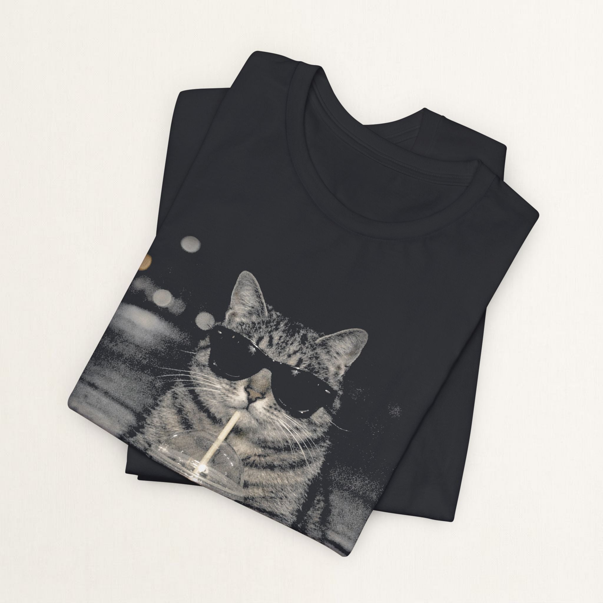Woman wearing vintage black Street Latte Cat graphic t-shirt, front view