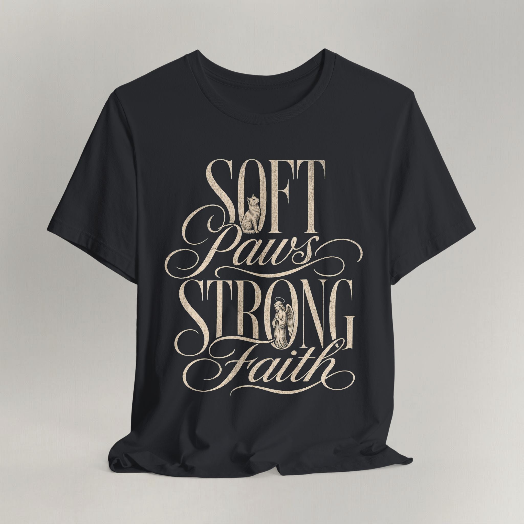 Vintage black cat t-shirt with a Soft Paws, Strong Faith script design, shown flat
