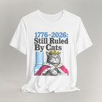 Flat lay of white graphic cat t-shirt with Ruled By Cats patriotic design