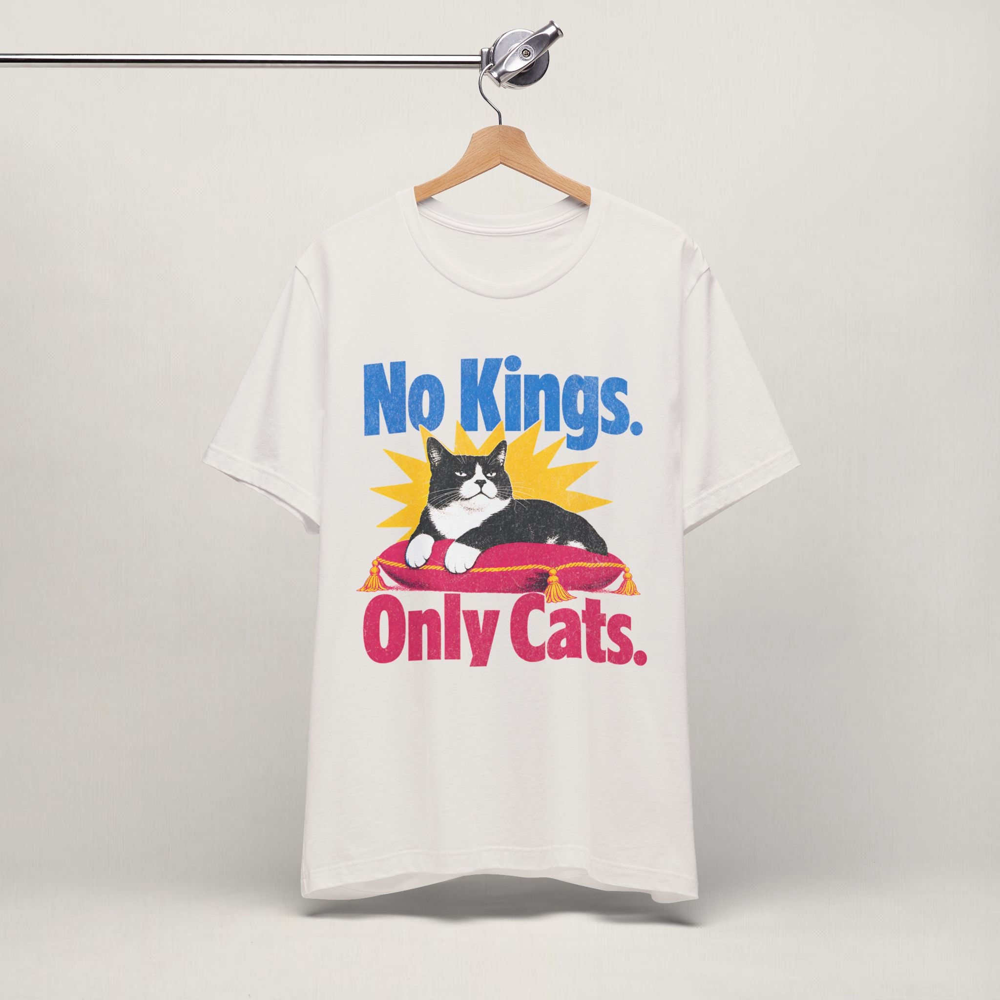 Flat lay of vintage white graphic cat t-shirt with No Kings Only Cats patriotic design