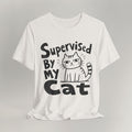 Vintage white t-shirt with hand-drawn Supervised By My Cat design and sketched striped cat