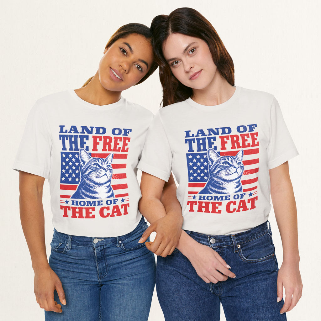 Styled flat lay of vintage white Land of the Free cat graphic tee