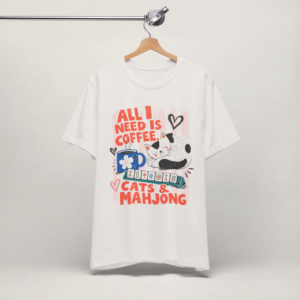 Vintage white All I Need Is Coffee, Cats and Mahjong cat t-shirt on a hanger