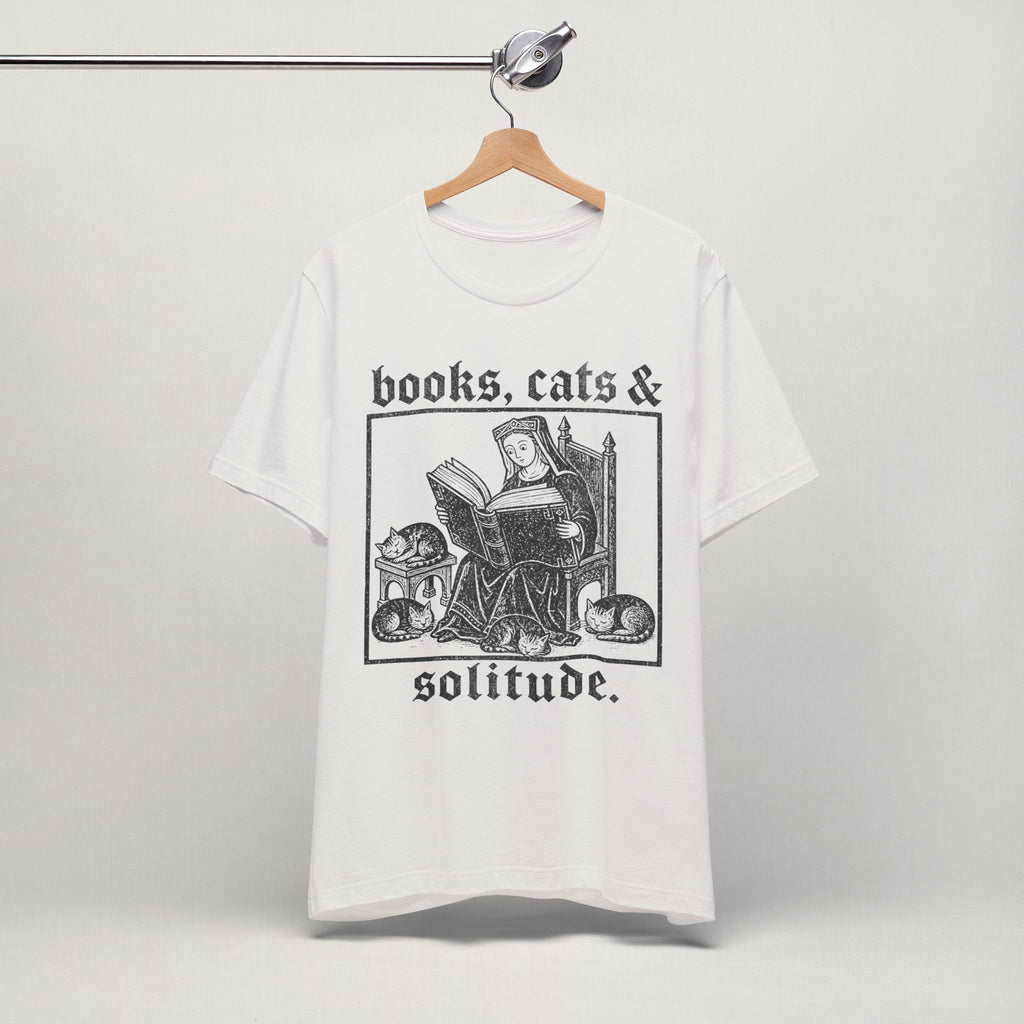 Vintage white Books, Cats and Solitude cat t-shirt on a hanger