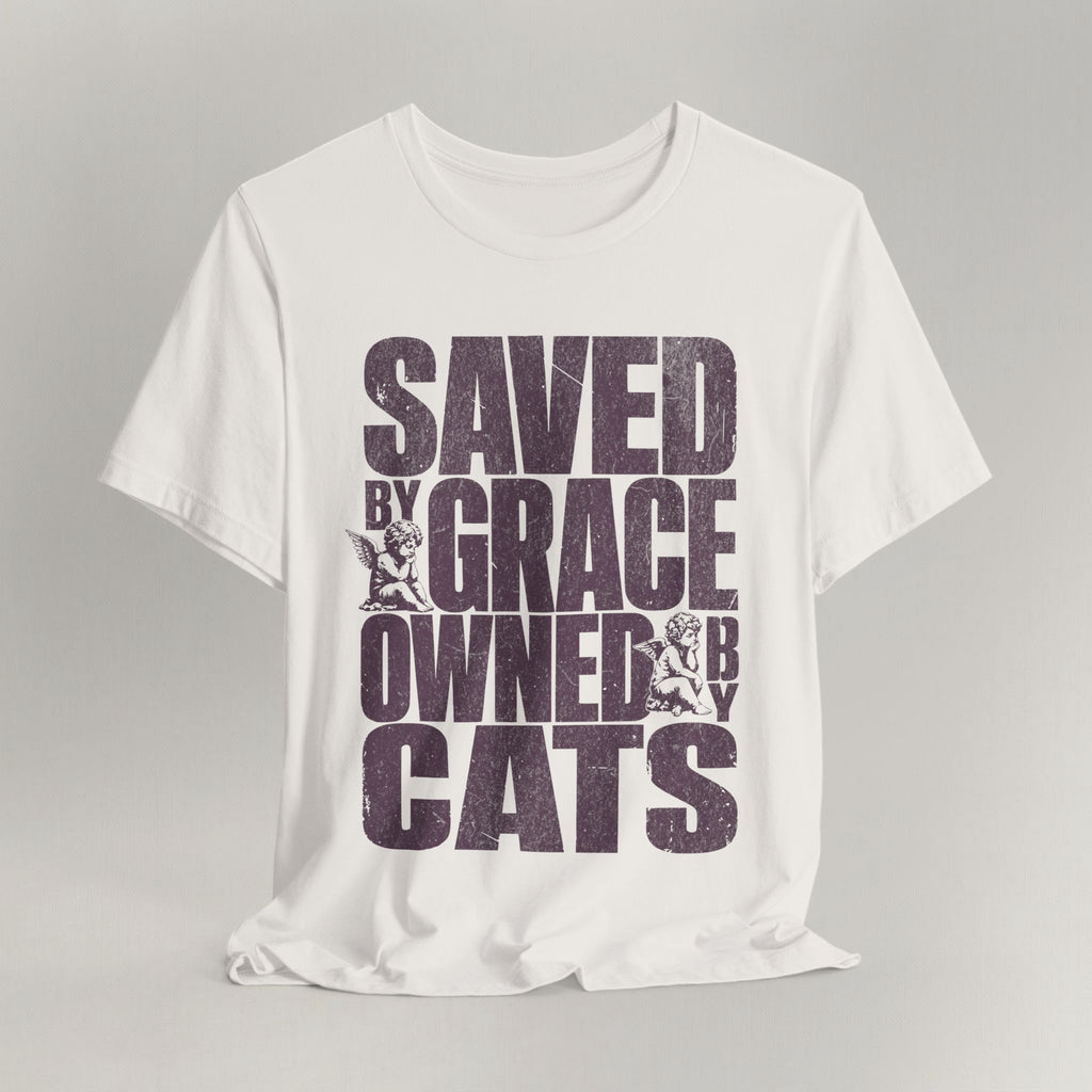 Vintage white cat t-shirt with a printed Saved by Grace Owned by Cats design, shown flat