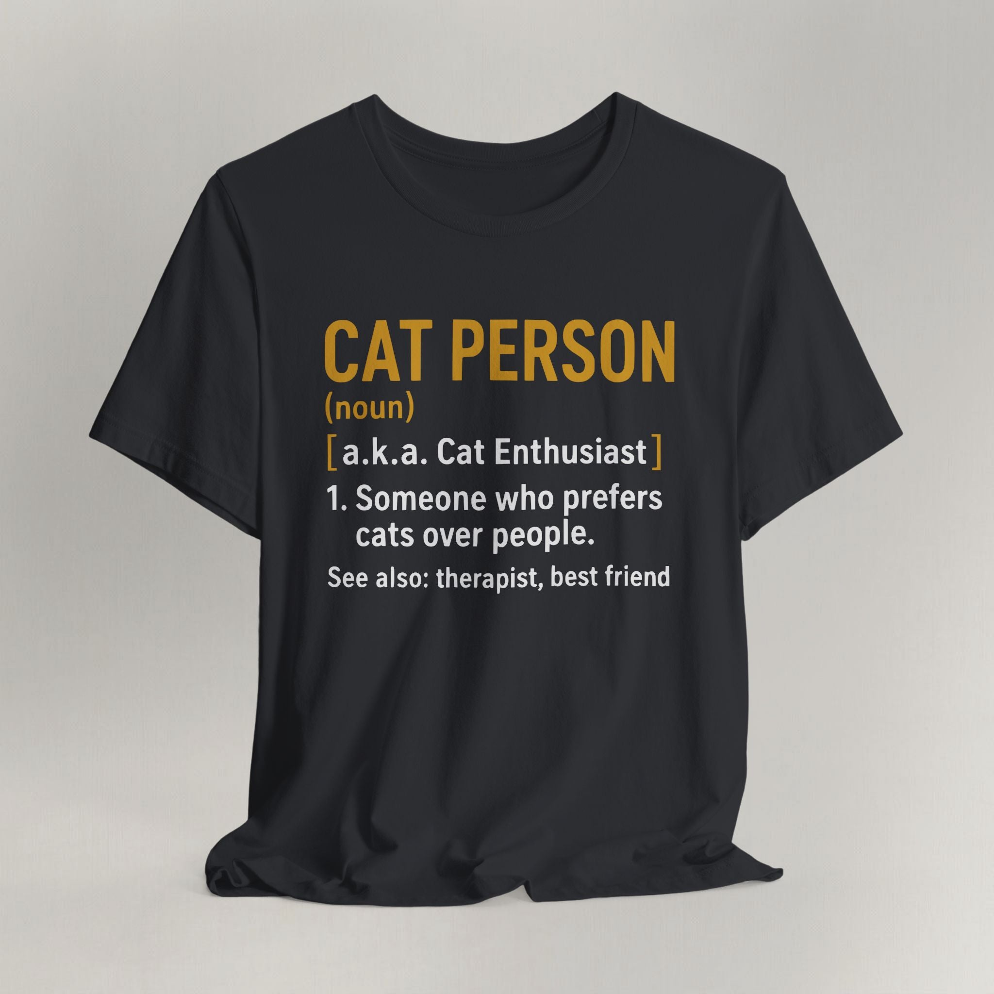 Vintage black cat t-shirt with a Cat Person dictionary definition design, shown flat