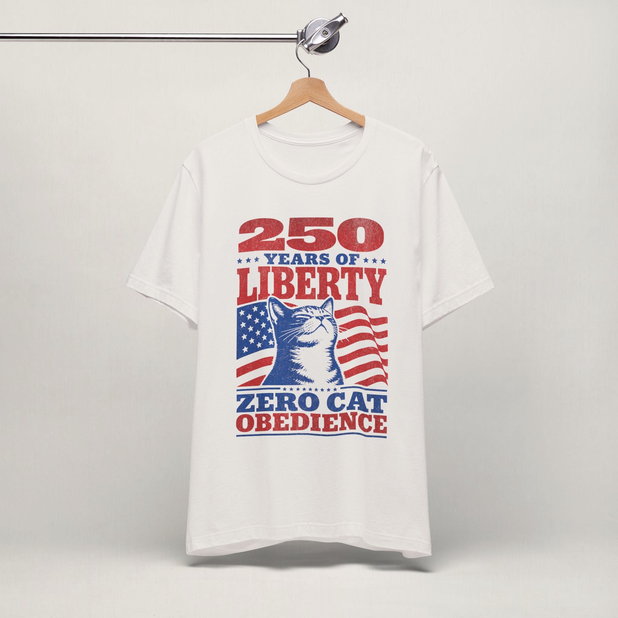 Vintage white 250 Years Of Liberty t-shirt hanging on a wooden hanger