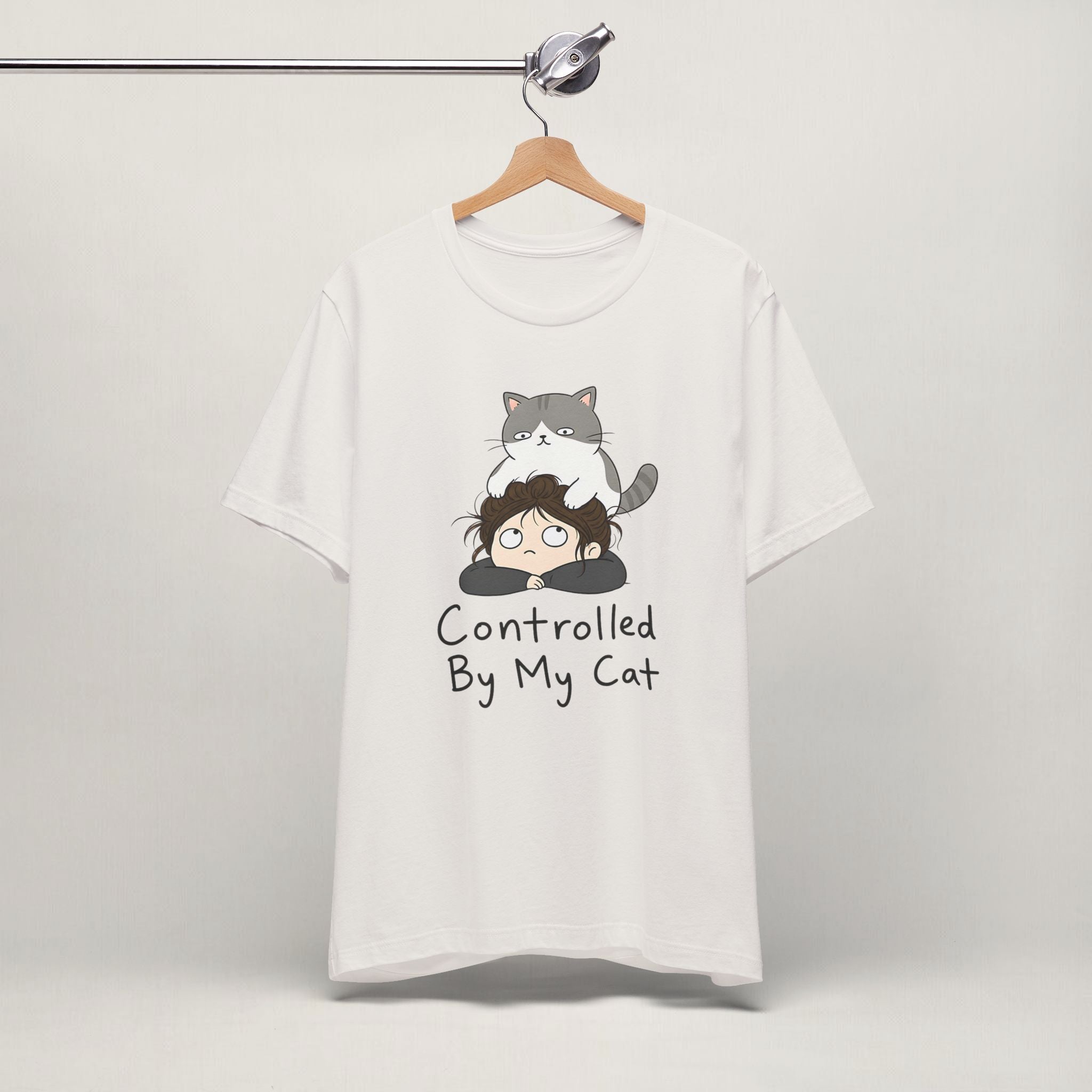 Close-up of Controlled By My Cat print on vintage white unisex t-shirt