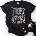 Black cat mom t-shirt with "Cat Mom Voice" distressed white lettering — graphic tee