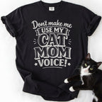 Black cat mom t-shirt with "Cat Mom Voice" distressed white lettering — graphic tee