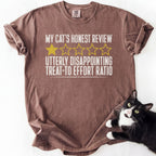 Brown garment-dyed cat humor shirt with deadpan cat review and "Utterly Disappointing" quote