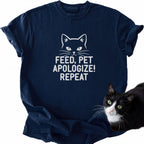 Navy blue funny cat mom shirt with bold 'Feed Pet Apologize' print and cat head