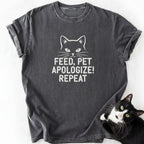 Dark gray cat dad t-shirt featuring 'Feed Pet Apologize' slogan and feline design