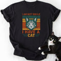 Black I Am Not Single cat graphic tee with orange stripes and text