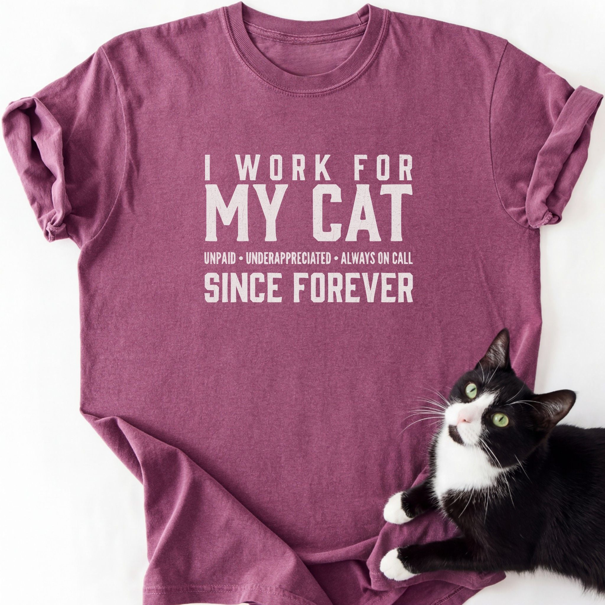 Maroon I Work For My Cat graphic tee with distressed text and cat photo