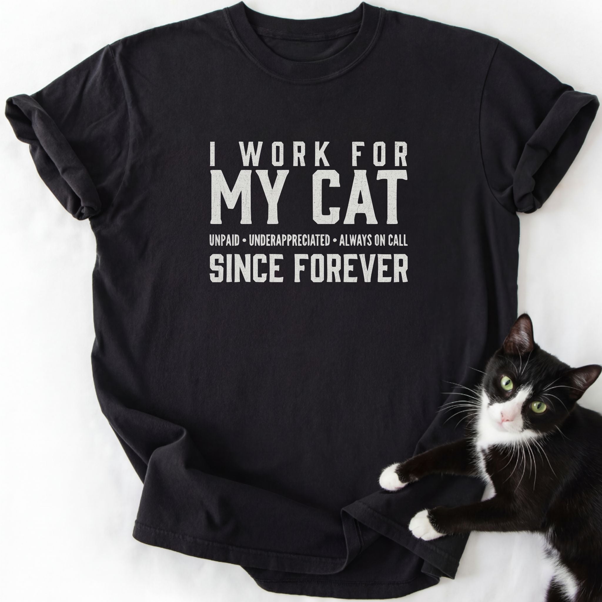 Black I Work For My Cat crewneck shirt with white distressed lettering and cat