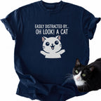 Navy blue Oh Look Cat graphic tee featuring white cartoon cat and humorous text