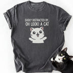 Dark gray Oh Look Cat graphic tee with 'Easily Distracted' text and cartoon cat design
