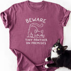 Maroon garment-dyed t-shirt with crouching cat graphic and 'Beware Tiny Panther' text