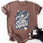 Brown garment-dyed tee with white space-themed cat illustration