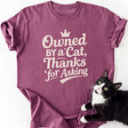Maroon Owned By a Cat graphic tee with crown and paw print design
