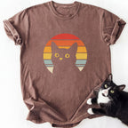 Retro black cat sunset graphic tee in brown with yellow eyes