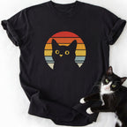 Retro black cat sunset graphic tee in black with yellow eyes