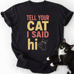 Tell Your Cat I Said Hi black cotton t-shirt featuring stacked text and cat illustration