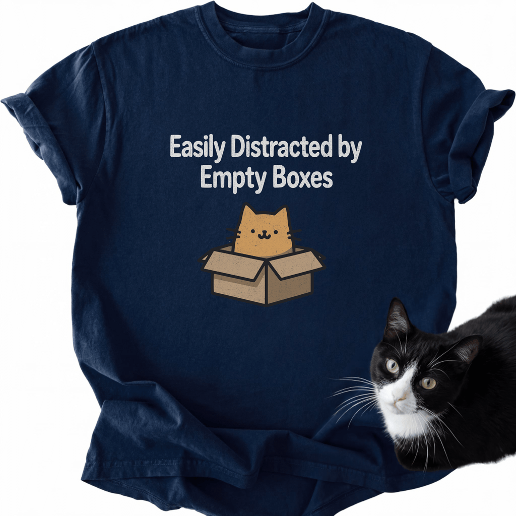 Navy blue cat meme t-shirt with tan cartoon cat in box and 'Easily Distracted by Empty Boxes' print