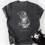 Dark gray garment-dyed t-shirt featuring 'I Need Space' cat meme print